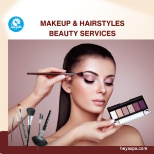 A professional makeup artist applying eyeshadow to a woman's eyelid at Heya Spa, with a variety of brushes and a palette on display.